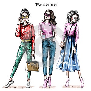 Hand drawn beautiful young women set. Stylish girls. Fashion women looks. Sketch.