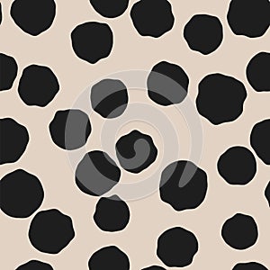 Hand drawn black polka dots seamless pattern. Irregular dotted print. Vector repeat illustration