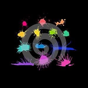 Hand drawn blots, splashes and blobs. Bright color blots on the black background.