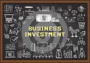 Hand drawn business icons about BUSINESS INVESTMENT on chalkboard