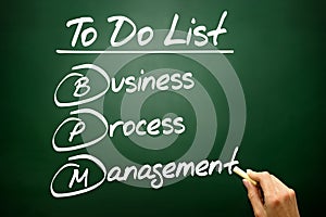Hand drawn Business process management (BPM) in To Do List, concept on blackboard..