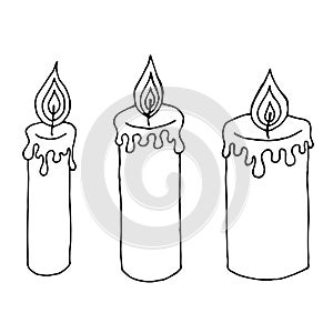 Hand drawn candles. Retro candlesticks. Hand drawn candles isolated on a white background.