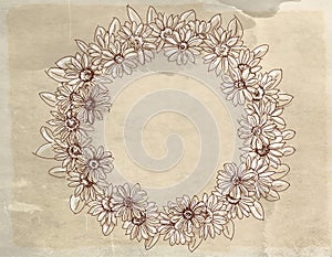 Hand drawn chamomile wreath on old paper background.