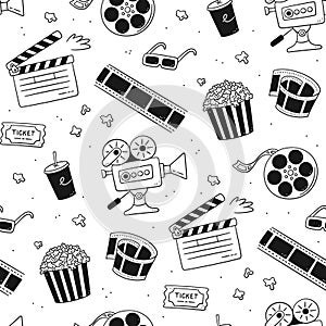 Hand drawn cinema seamless pattern with movie camera, clapper board, cinema reel and tape, popcorn in striped box, film