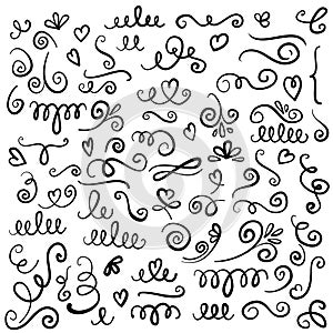 Hand drawn decorative curls and swirls. A collection of vintage vector design elements. Ink illustration