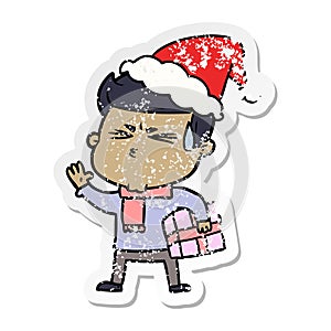 hand drawn distressed sticker cartoon of a man sweating wearing santa hat