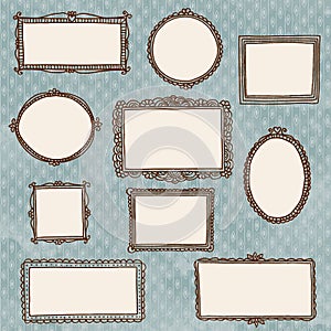 Hand drawn doodle picture frames on wallpaper photo
