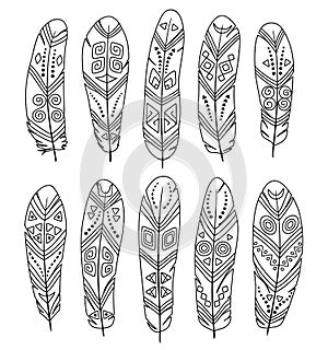 Hand drawn ethnic feathers set isolated on white background. Collection of tribal elements. Template for coloring book.