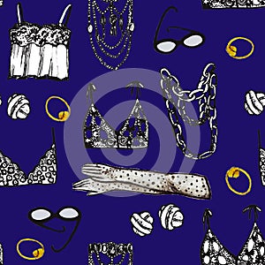 Hand drawn femine underwear and bijuoterie pattern deep blue background photo