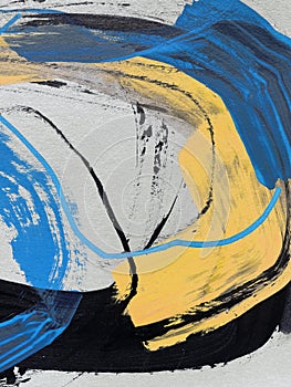 Hand-drawn frame abstract circles on canvas. paint black and blue strokes on background. photo