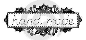 Hand drawn frame, label or logo with flowers, berries, seam and inscription `hand made`