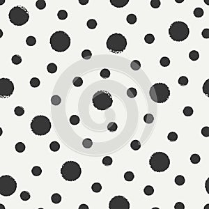 Hand drawn geometric seamless ink polka dot pattern.