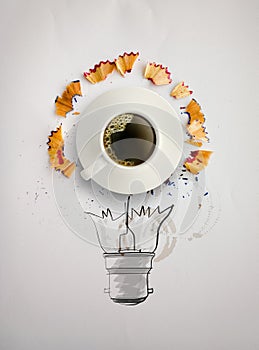 Hand drawn light bulb with pencil saw dust