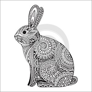 Hand drawn orante rabbit with ethnic floral doodle pattern