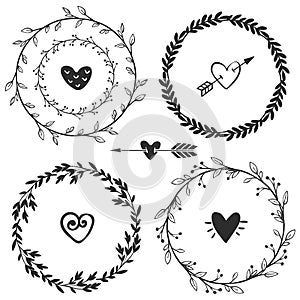 Hand drawn rustic vintage wreaths with hearts. Floral vector