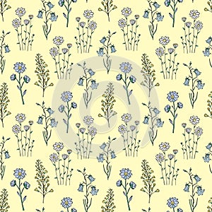 Hand drawn seamless pattern of blooming wildflowers, canterbury bells, chamomile. Floral collection on a yellow background.