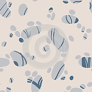 Hand drawn seamless pattern with blue grey stone pebbles on beige sand background. Sea ocean coastal chic marine