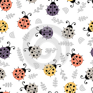 Hand drawn seamless pattern with cute ladybugs. Simple graphic design. Scandinavian floral style. Lovely background