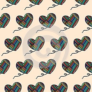 Hand drawn seamless pattern of hearts wool yarn colored rainbow for texture for clothes package wrapping