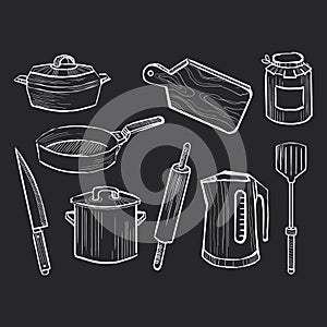 Hand drawn set of kitchen utensils on a chalkboard