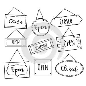 Hand drawn set of open and closed door sign. Doodle sketch style. Shop door or window open label.