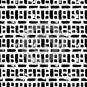 Hand drawn short brush strokes seamless pattern.