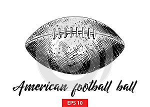 Hand drawn sketch of american football ball in black isolated on white background. Detailed vintage etching style drawing.