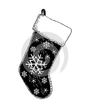 Hand drawn sketch of Christmas sock in black isolated on white background. Detailed vintage etching style drawing.
