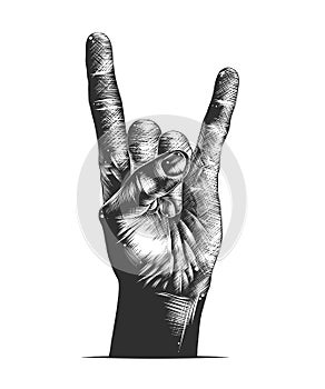Hand drawn sketch of rock sign gesture in monochrome isolated on white background. Detailed vintage woodcut style drawing.