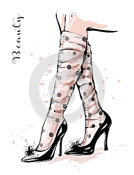 Hand drawn stylish female legs in shoes. Woman legs with spotted sheer tulle socks. Fashion sketch. photo