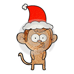 hand drawn textured cartoon of a hooting monkey wearing santa hat