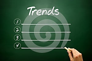 Hand drawn TRENDS blank list concept on blackboard photo