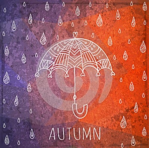 Hand-drawn umbrella and raindrops on a grunge background. Vector. Autumn theme.