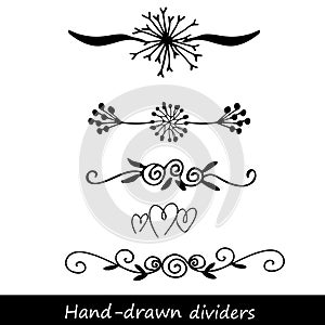 Hand drawn vector dividers. Lines, borders and laurels set. Doodle design elements.