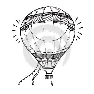 Hand drawn vector illustration - hot air balloon in the sky. Sketch