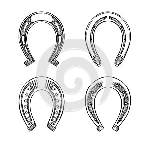 Hand drawn vector illustration - Set of horseshoes.