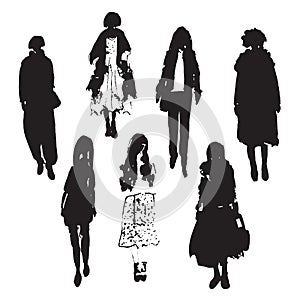 Hand-drawn vector illustration: stylized people. Watercolor sketches. Three women fashionably dressed