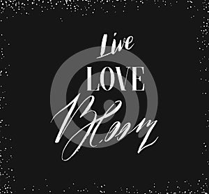 Hand drawn vector ink graphic handwritten calligraphy lettering text Live Love Bloom isolated on black background.Spring