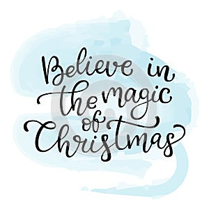 Hand drawn vector lettering Believe in the magic of Christmas. I