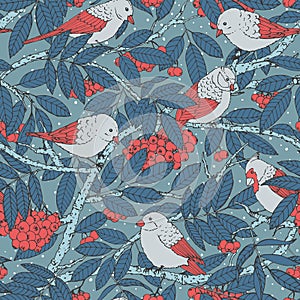 Hand drawn vector seamless pattern with birds, branches, leaves and rowanberry on blue dotted background