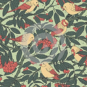 Hand drawn vector seamless pattern with birds, branches, leaves and rowanberry on green dotted background.