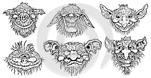 Hand drawn vector set with engraved funny demon or gnome faces isolated on white