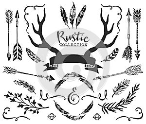 Hand drawn vintage antlers, feathers, arrows with lettering. Rustic decorative vector design set.