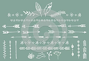 Hand drawn vintage arrows, feathers, dividers and floral elements