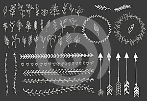 Hand drawn vintage arrows, feathers, dividers and floral elements