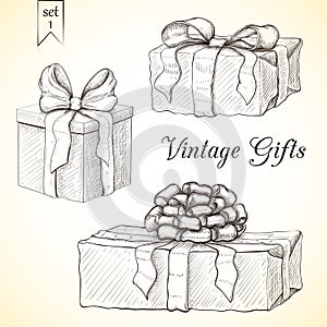 Hand drawn vintage gift box collection. engraved illustration of presents isolated. icon set of present boxes with bow