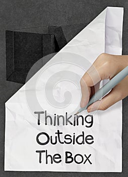 Hand draws think outside the box