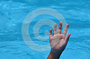 Hand of a drowning child