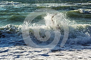 Hand of drowning man trying to swim out of the stormy ocean. Drowning victim needing help, asking for help. Failure and rescue co photo