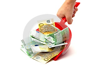 Hand, dustpan, money